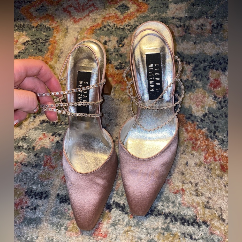 Pink satin Stuart Weitzman slingback heels w/ pointed toe and rhinestone details